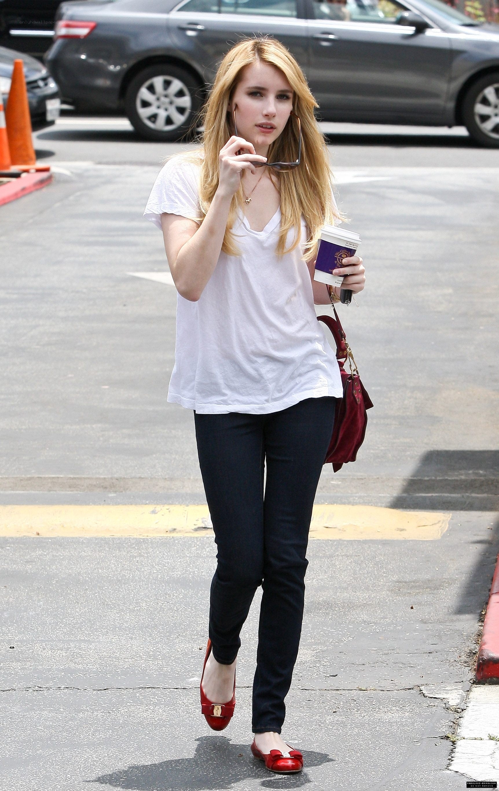 Woman walking with coffee