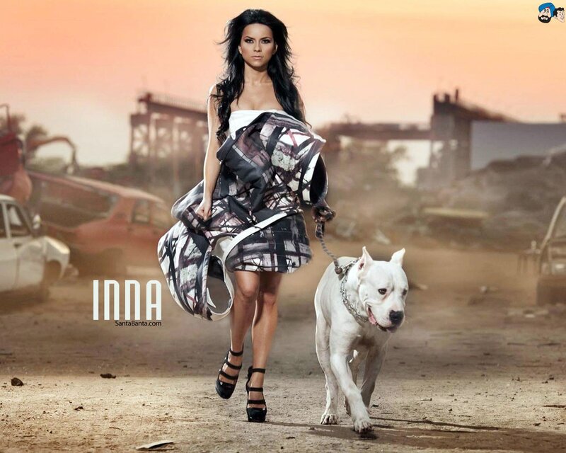 woman walking with dog in junkyard