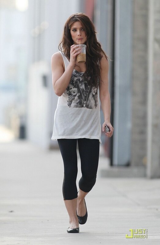 woman walking with drink
