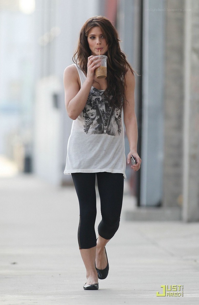 woman walking with drink