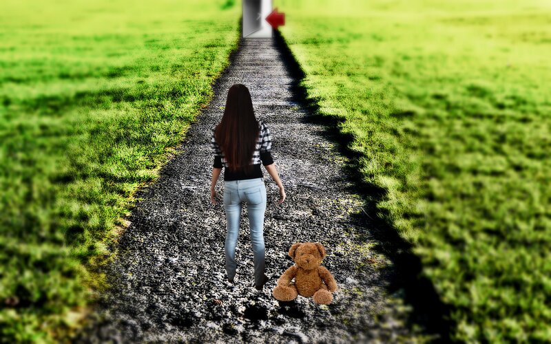 Woman Walking with Teddy Bear