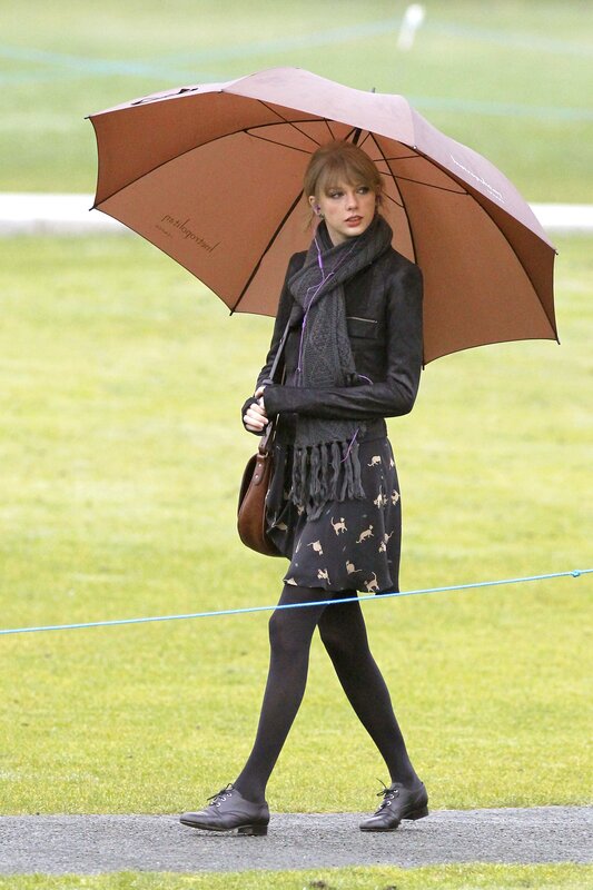 woman walking with umbrella