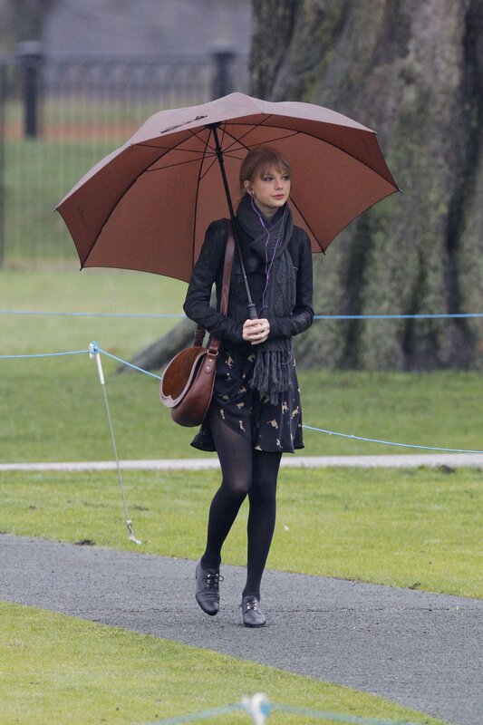 woman walking with umbrella