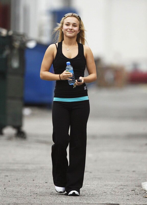 woman walking with water bottle