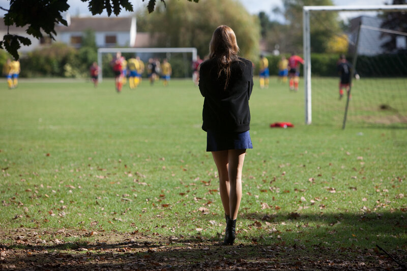 Woman Watching Soccer Game