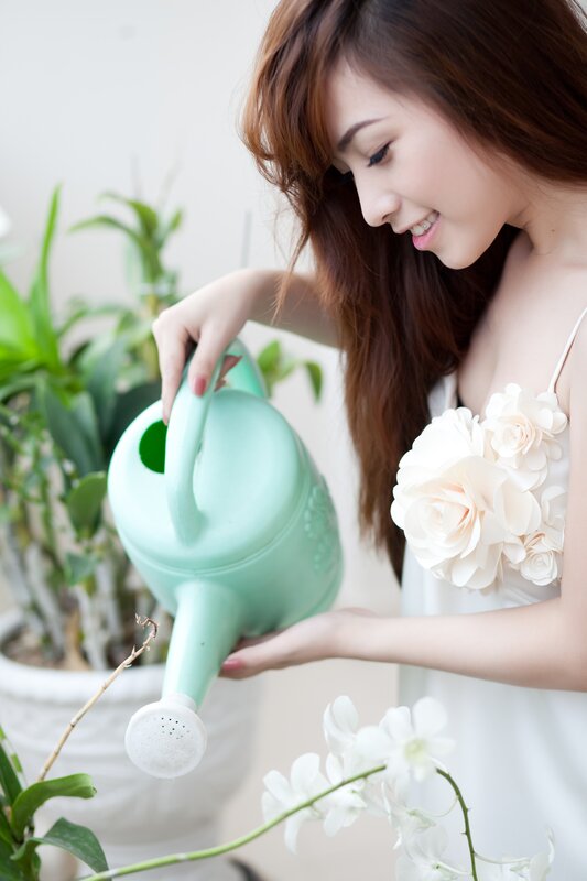 woman watering plants