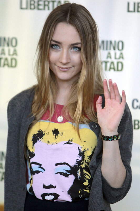 woman waving at event