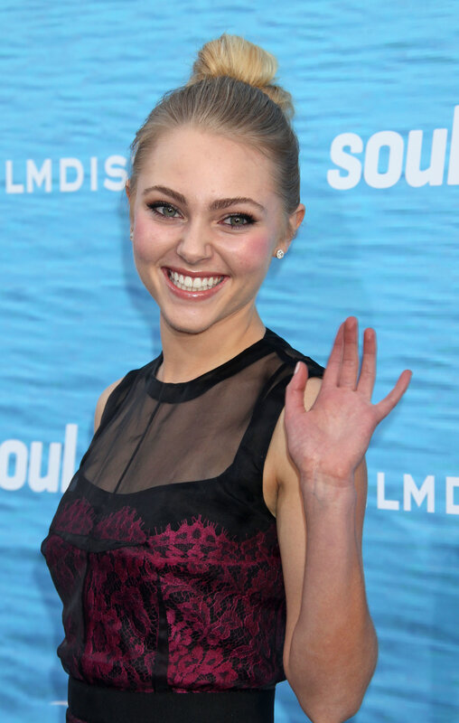 woman waving at event