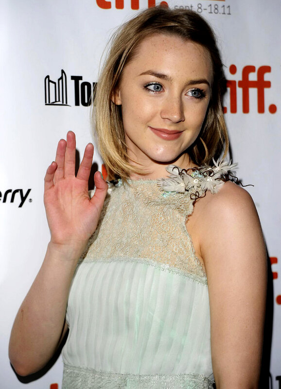 woman waving at event