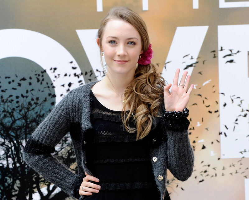 woman waving at event