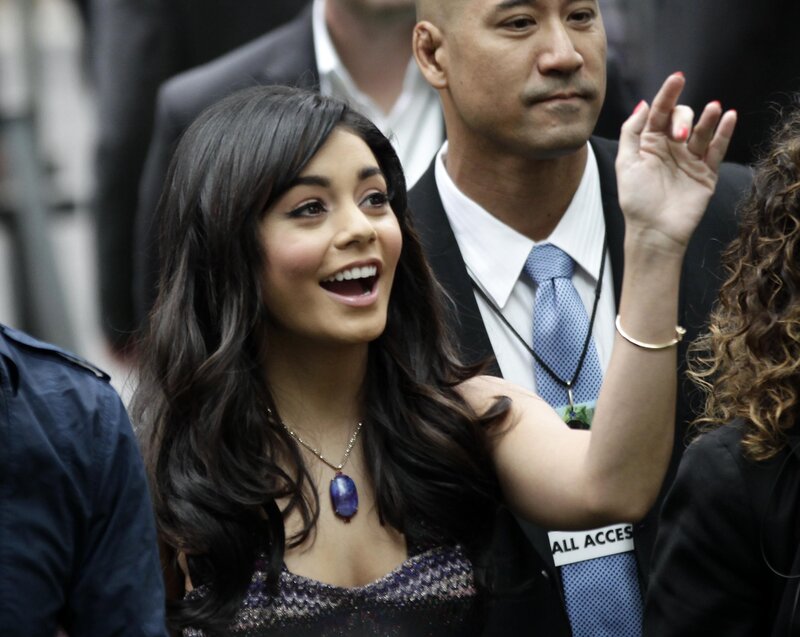 woman waving at event