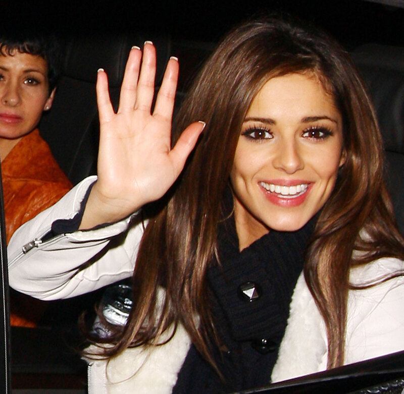 woman waving from car