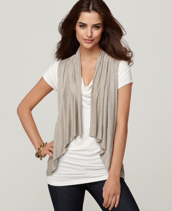 woman wearing a beige vest