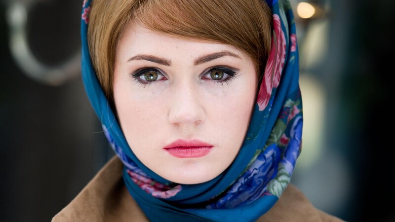 woman wearing a floral headscarf