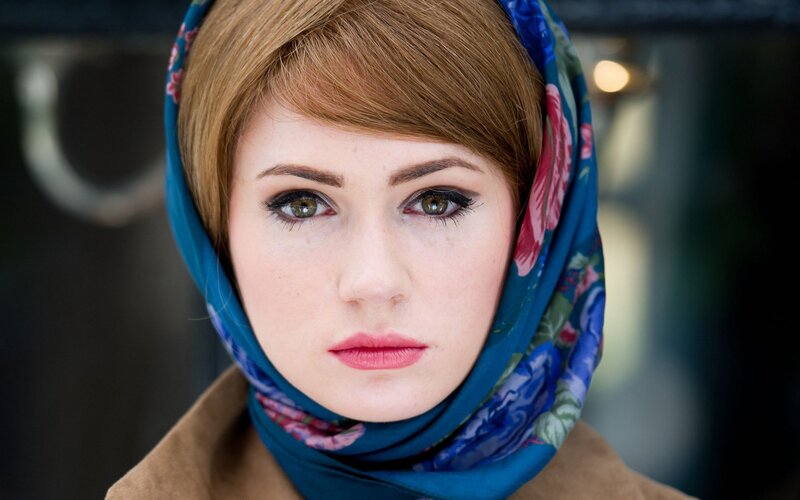 woman wearing a floral headscarf