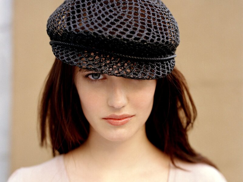 woman wearing a mesh hat