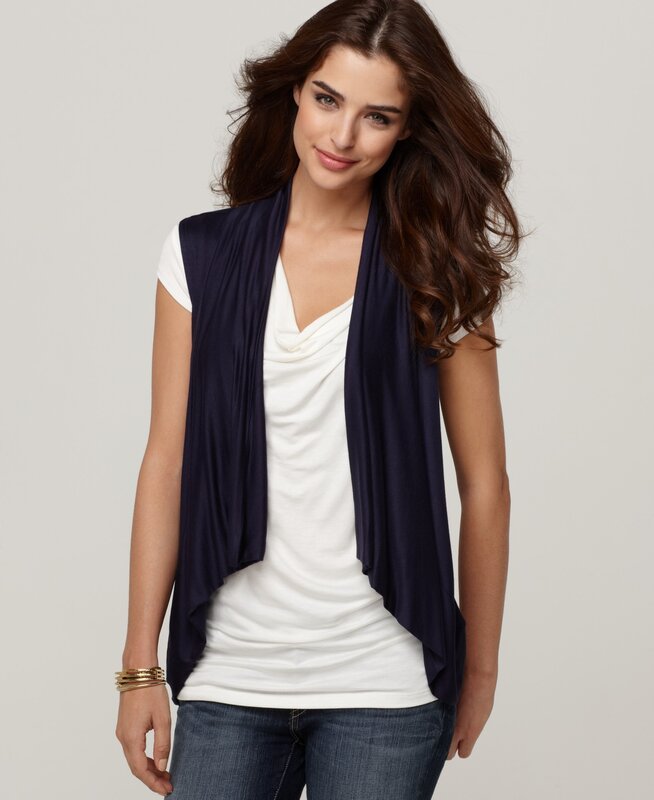 woman wearing a navy vest