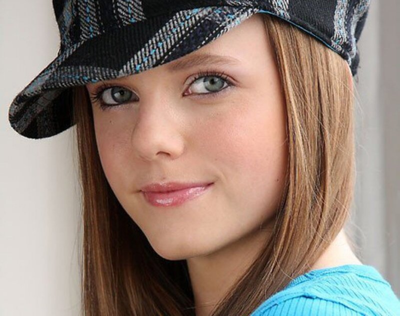 woman wearing a plaid hat