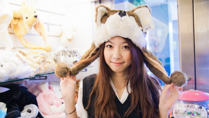 woman wearing animal hat