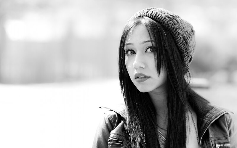 Woman Wearing Beanie — Black, Contemplative, Photograph