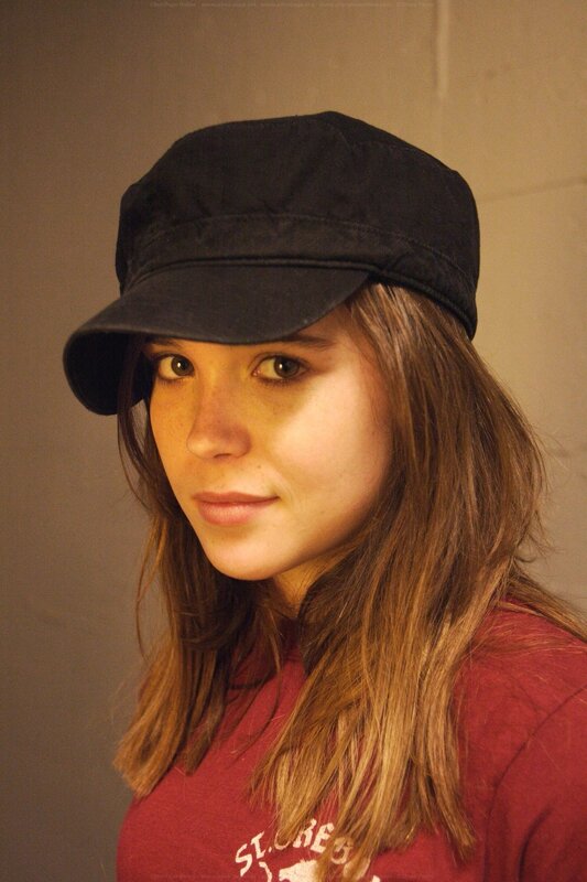 woman wearing black cap