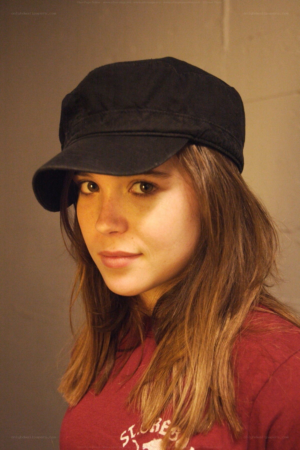 woman wearing black cap