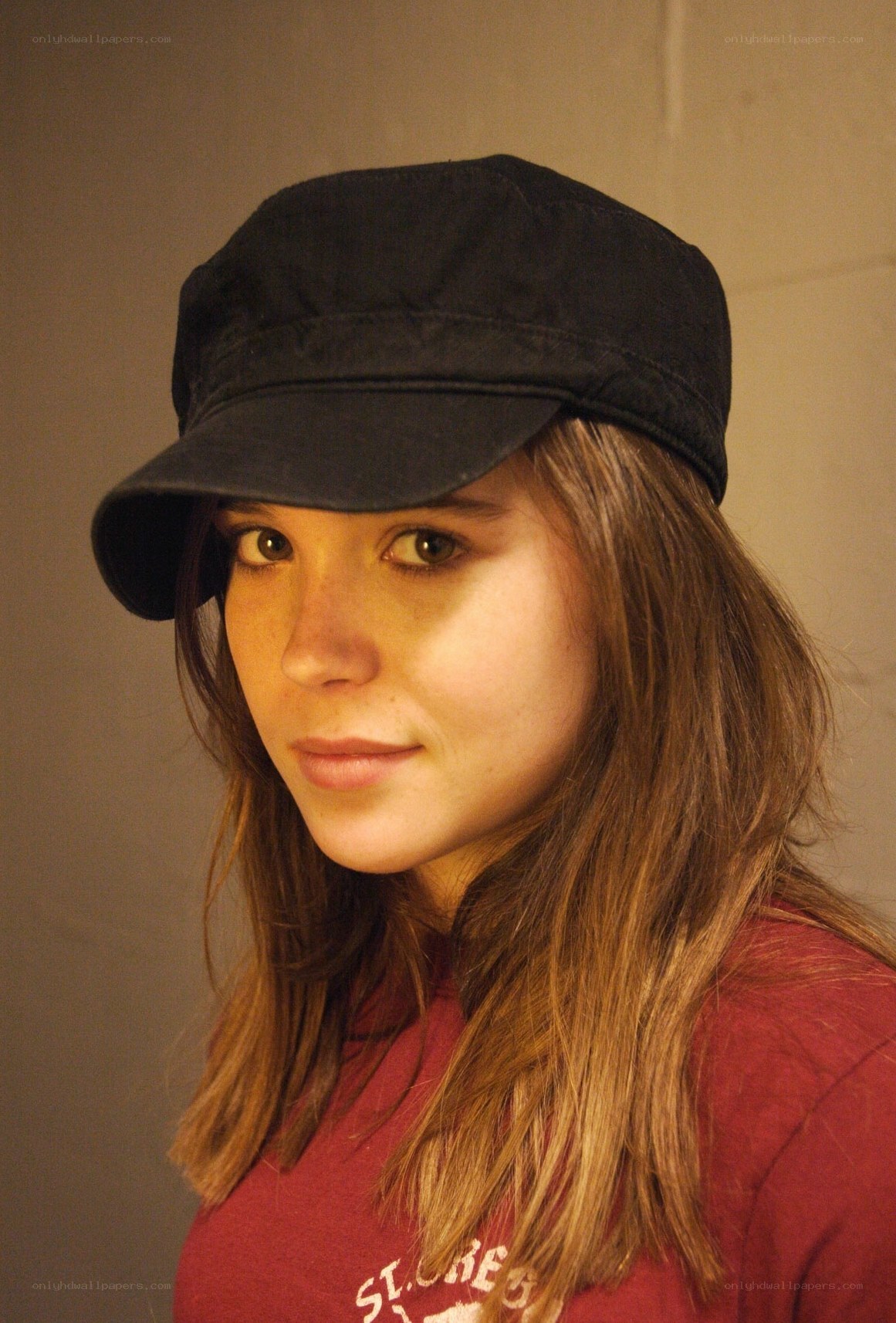 woman wearing black cap