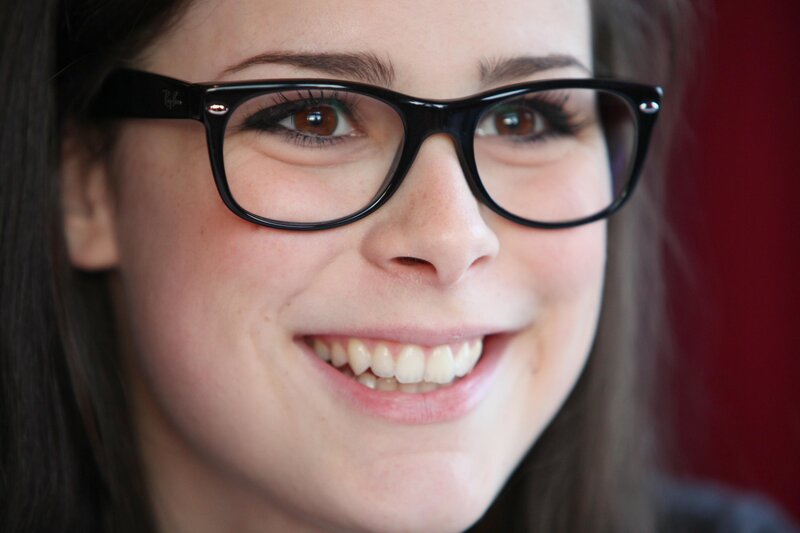 woman wearing black glasses