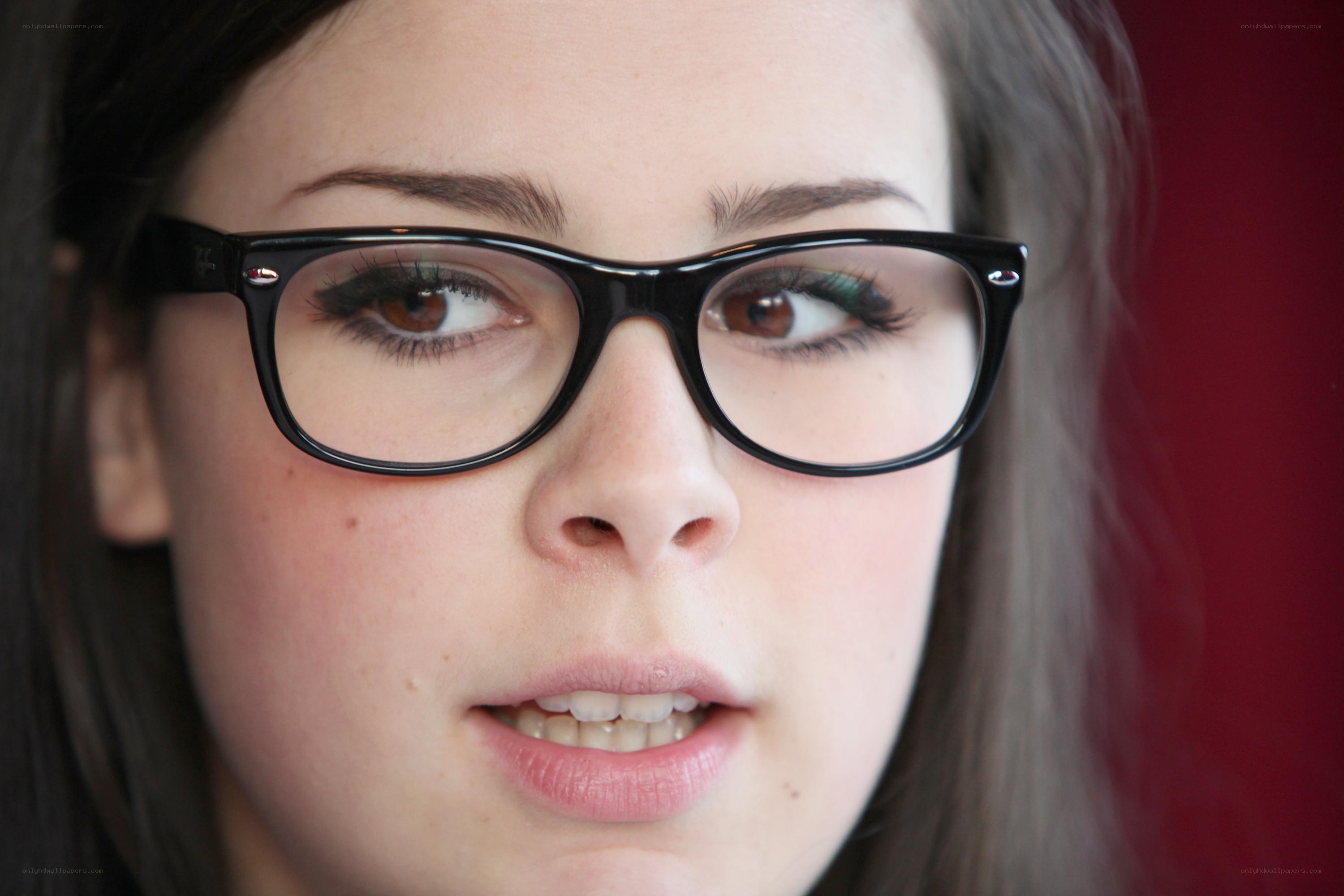 woman wearing black glasses