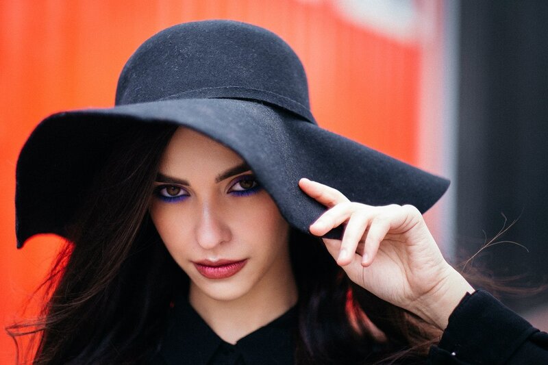 Woman Wearing Black Hat — Dramatic, Photograph, Makeup, Hand