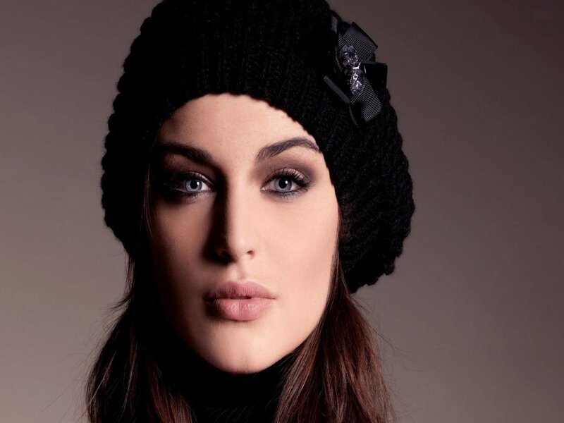 Woman Wearing Black Hat — Serious