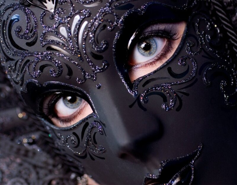 Woman Wearing Black Mask — Dramatic