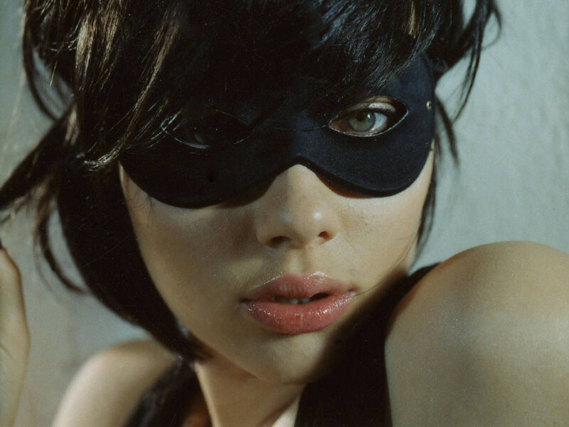Woman Wearing Black Mask