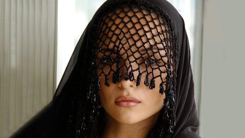 Woman Wearing Black Veil — Serious