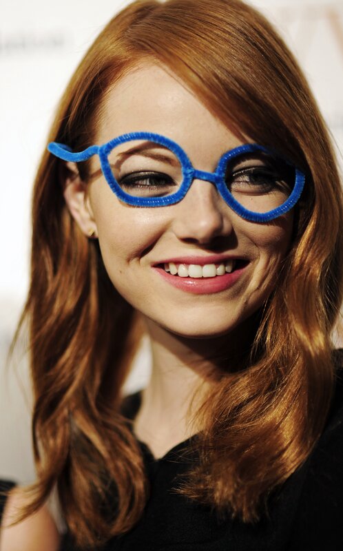 woman wearing blue pipe cleaner glasses