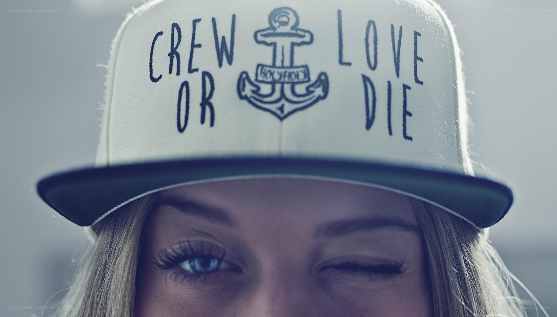 woman wearing cap with text