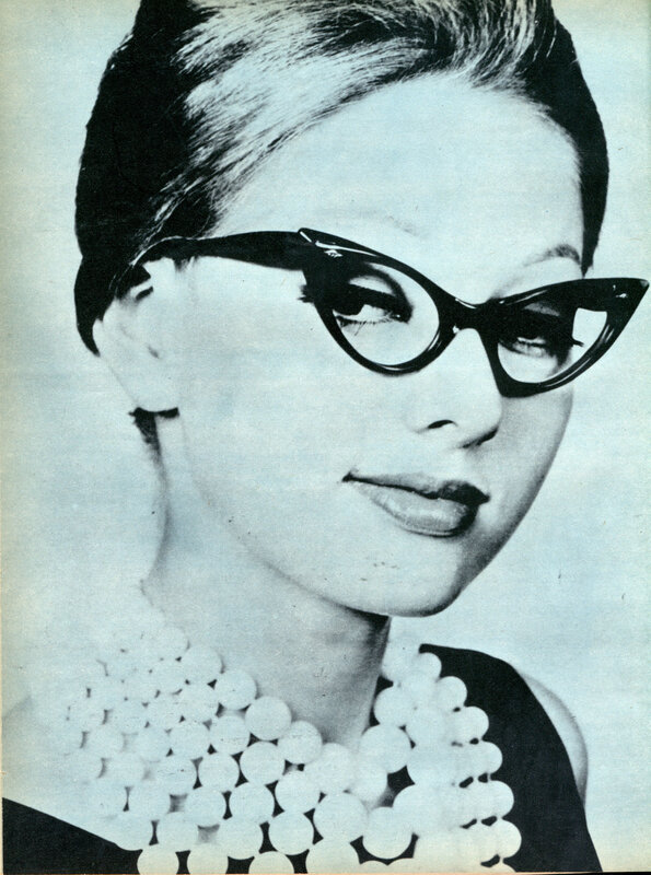 woman wearing cat-eye glasses