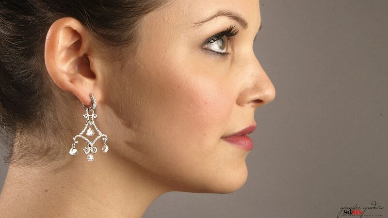woman wearing chandelier earrings