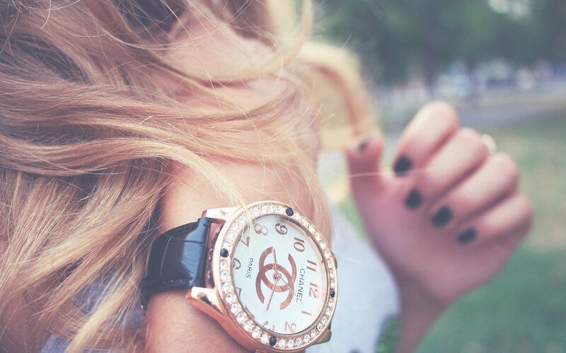 woman wearing chanel watch