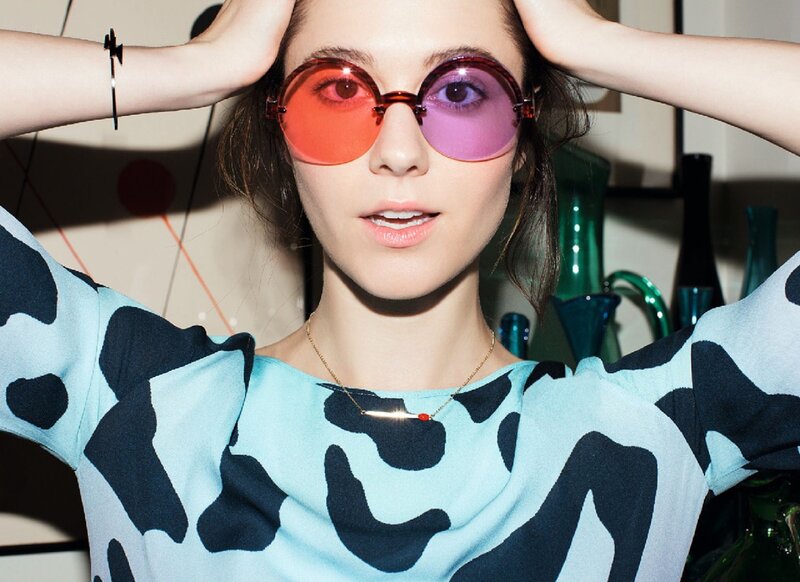woman wearing colorful sunglasses