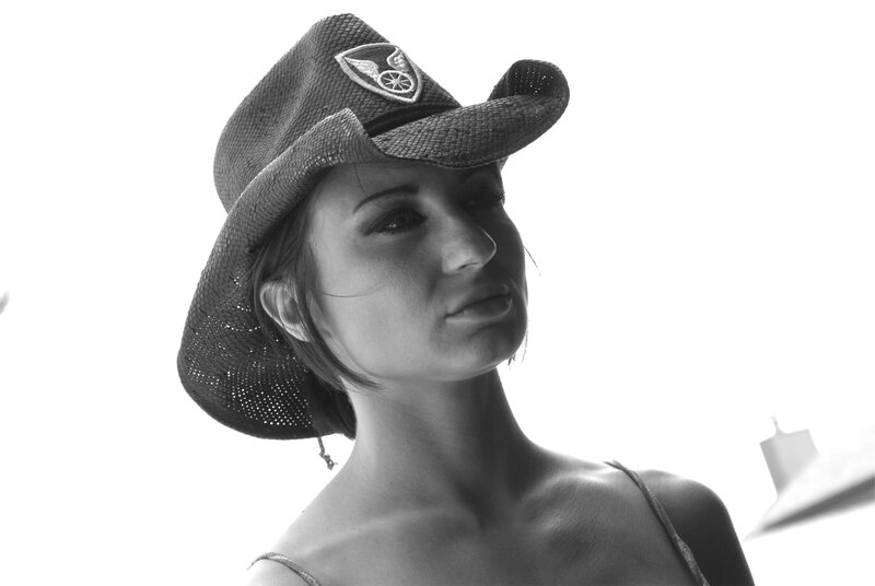 Woman Wearing Cowboy Hat — Black, Dramatic, Photograph, Cowboy Hat, Shoulder Strap