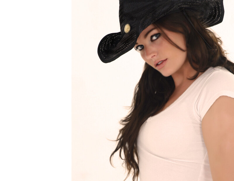 Woman Wearing Cowboy Hat — Black, Neutral
