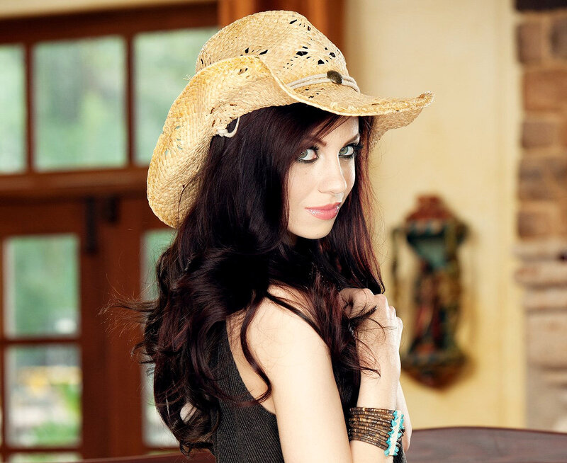 Woman Wearing Cowboy Hat — Brown, Confident