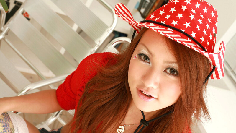Woman Wearing Cowboy Hat — Red