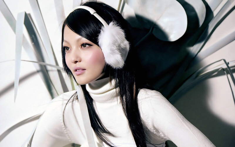 Woman Wearing Earmuffs — White