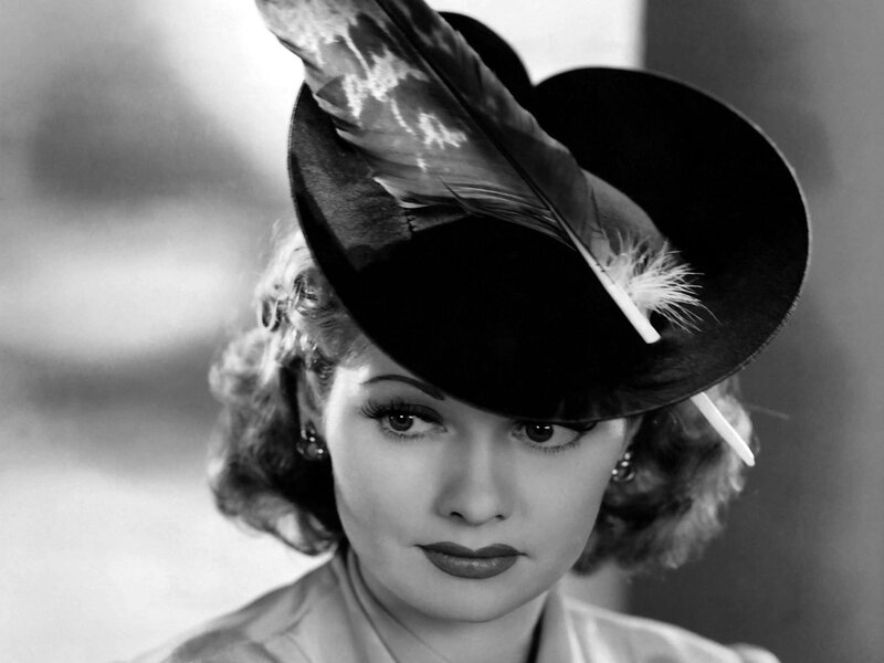 Woman Wearing Feather Hat — Black