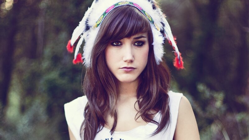 woman wearing feather headdress