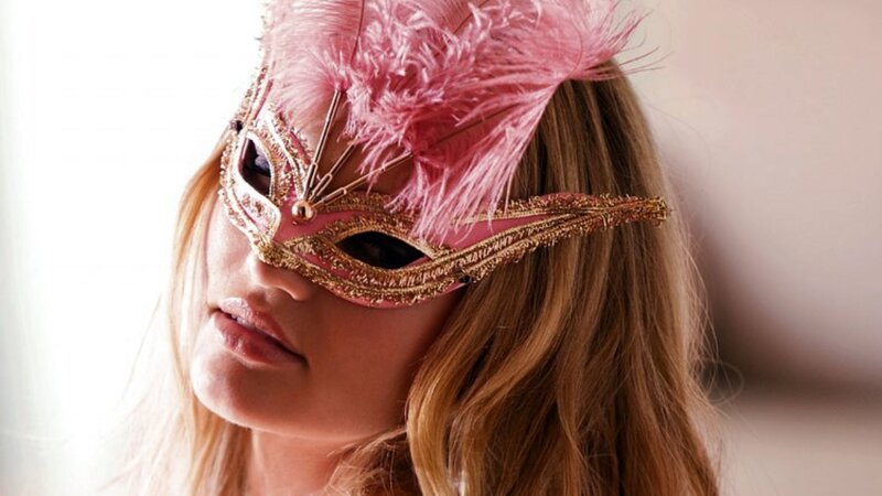 Woman Wearing Feather Mask — Pink