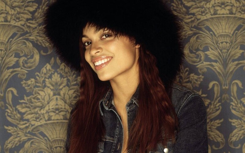 Woman Wearing Fur Hat — Brown, Smiling