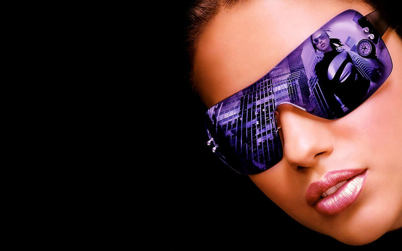woman wearing futuristic sunglasses
